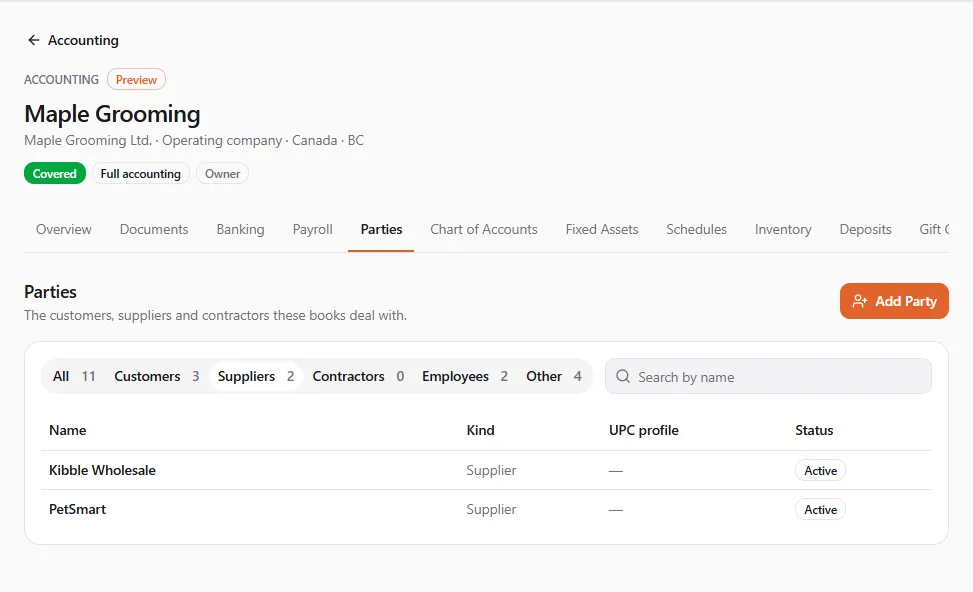 The Parties tab of Maple Grooming Ltd. on the Suppliers filter: Kibble Wholesale and PetSmart, both Active with no UPC profile, the counts per kind, the name search and the Add Party button